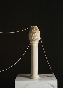 Abstract twine sculpture on small pedestal