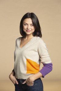 Portrait confident woman in sweater
