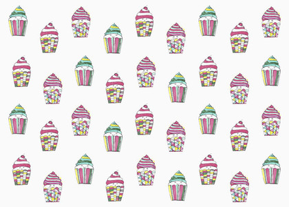 Pastel colored cupcakes on white background