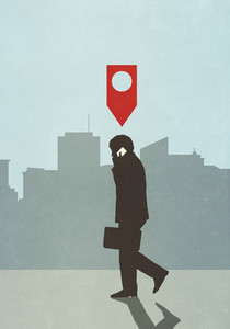 Map pin icon above businessman walking and talking on smart phone in city