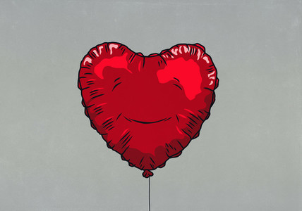 Smiling red heart shape balloon