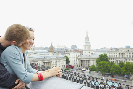 Happy affectionate couple above Trafalgar Square