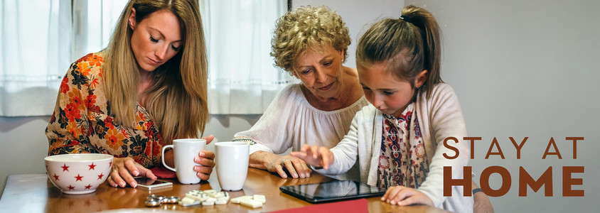 Three female generations using tablet and smartphone