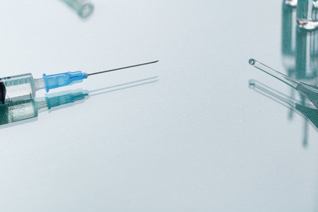 Syringe with an injection