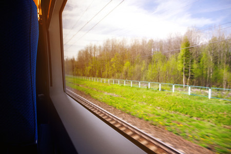 View on landscape from train window  The concept of travel and vacation