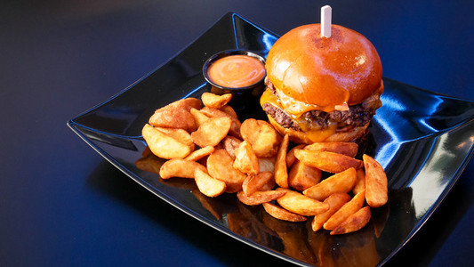 Hamburger and fries on a table