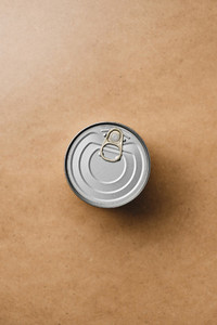 Top view on a canned food on a beige background  Minimal style food photography