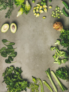 Flat lay of whole and cut vegetables and herbs  copy space