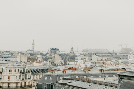 Aerial view of cloudy Paris with grey sky