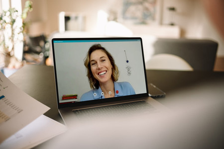 Businesswoman on a video call with her colleague