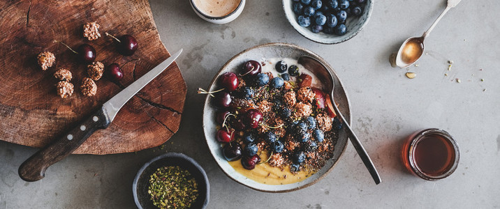 Quinoa oat granola with seeds and fruits and coffee