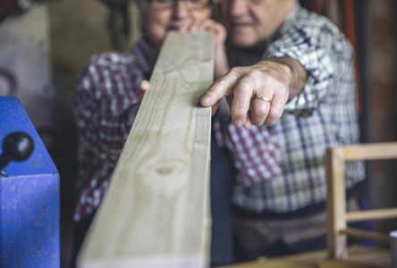 Senior couple in a carpentry