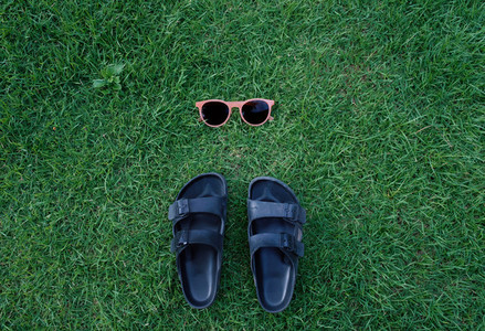 Flat lay summer fashion accessories concept of sunglasses and sa