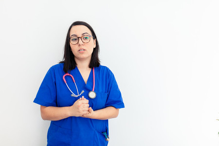 Doctor woman isolated on withe background gesturing
