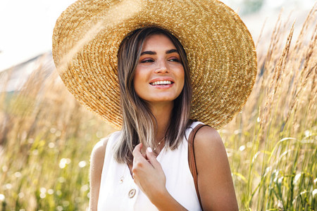Beautiful smiling woman in hat