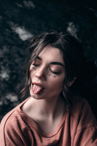 Portrait cute girl with tongue