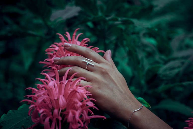 Woman hand on natural background
