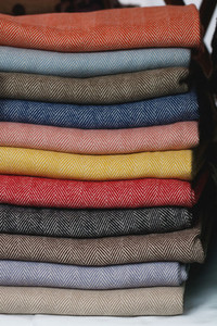 Stack of colored warm scarves
