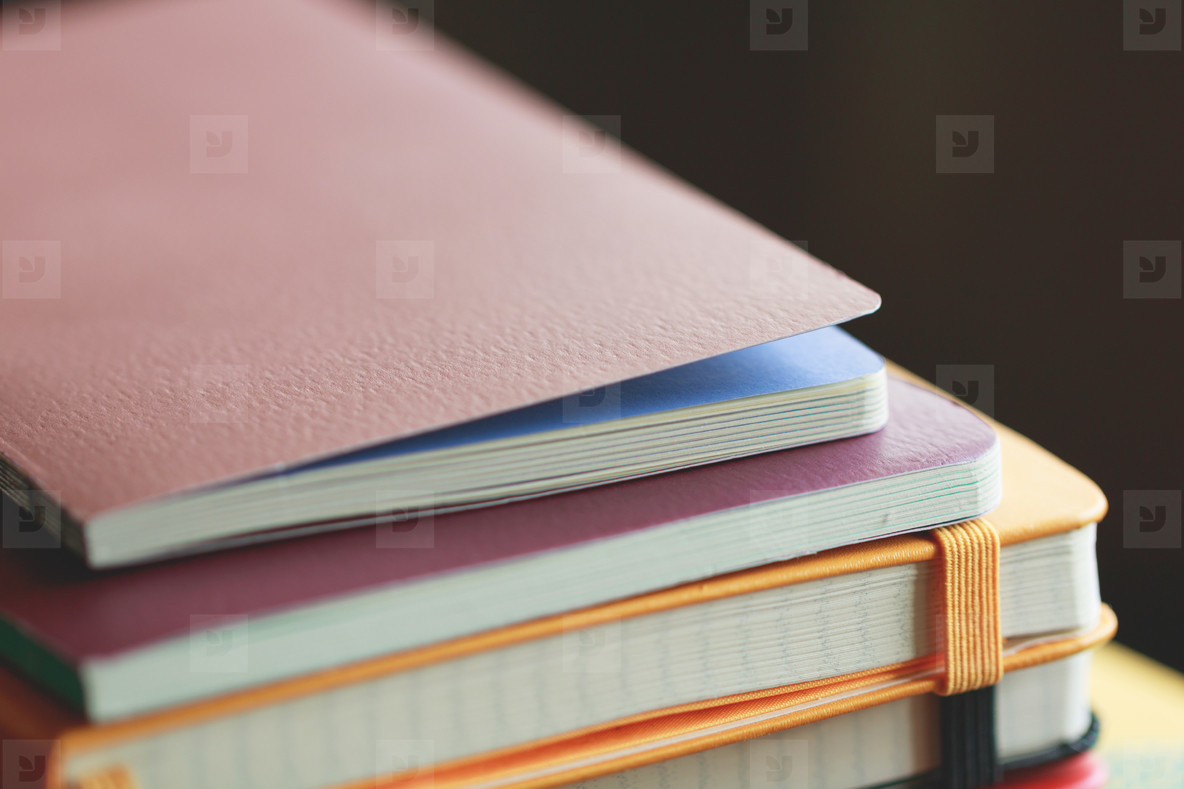 Stack of colorful notebooks
