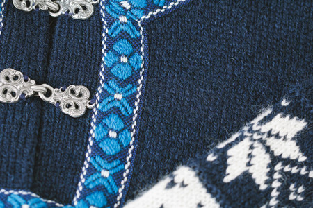 Close up of a blue and white Norwegian wool sweater