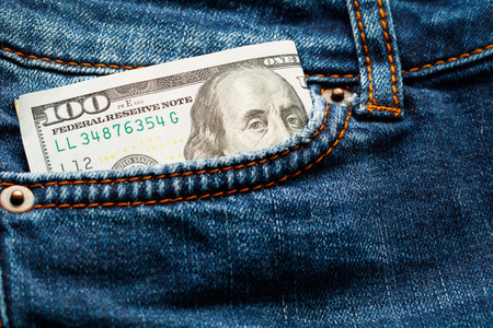 Hundred dollar bill in jeans pocket  Close up
