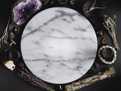 Top view at place for practice witchcraft  White marble tray surrounded magic ritual things