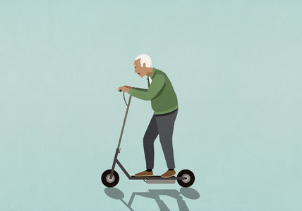 Senior man riding motorized scooter