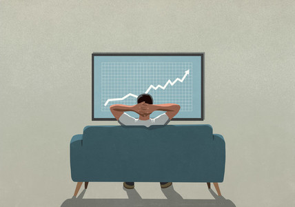 Man on sofa watching rising stock market data on TV