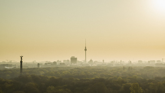 Golden sunset over Television Tower and Volkspark Friedrichshain park