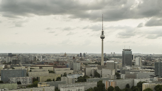 Television Tower and Berlin cityscape under cloudy sky