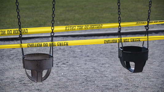 Playground swings taped off during COVID 19 pandemic