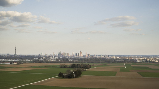 Rural farmland with city of Frankfurt in backgroundy