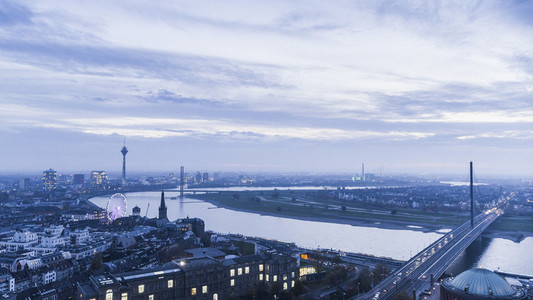 Rhine River and cityscape at dusk