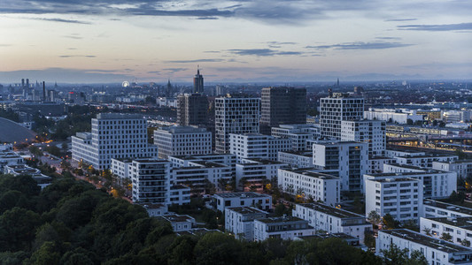 Munich cityscape and Hirschgarten at dusk
