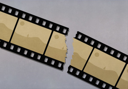 Ripped camera film negative of landscape