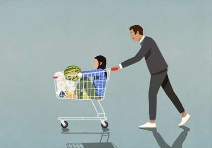 Father pushing daughter and groceries in shopping cart