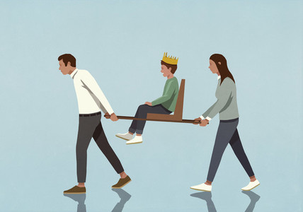 Parents carrying son with crown in chair