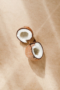 Summer abstract creative composition with coconut a on kraft paper