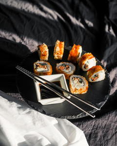 Sushi roll and soy sauce