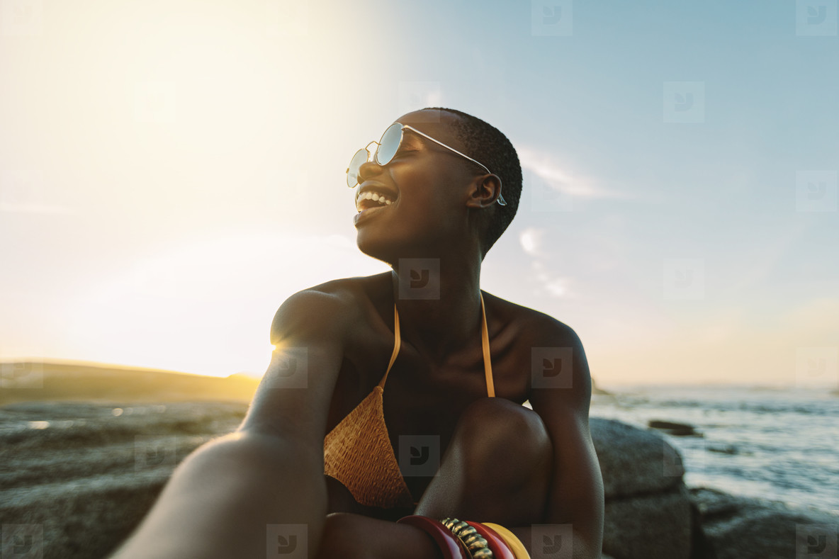 Woman having great time on beach vacation