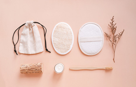 Flat lay of sustainable products  bamboo toothbrush  skin scrub
