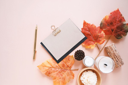 Flat lay of mockup greeting card and autumn holiday concept back