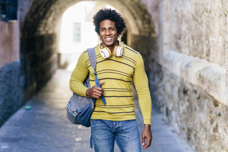 Black man with afro hair sightseeing in Granada