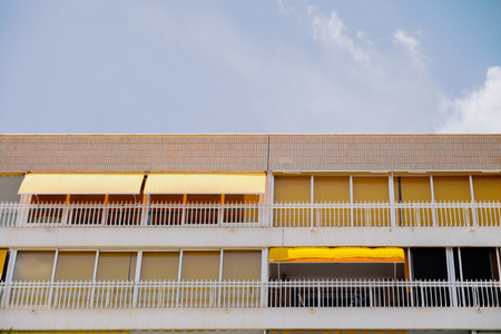 Apartment building pattern balconies near a beach