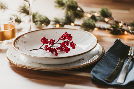 Festive table setting with winter decor  The concept of Thanksgiving or Christmas family dinner
