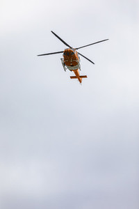 Rescue helicopter flying in sky