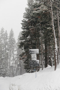 Snow advisory signs Yosemite National Park USA