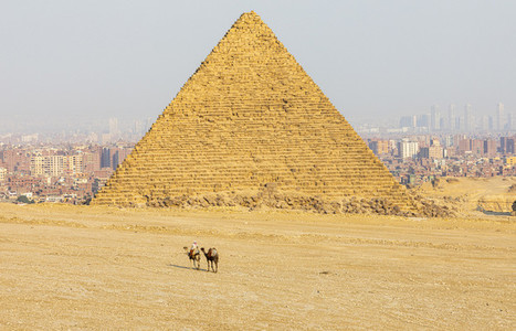 Giza pyramid and cityscape on sunny day Cairo Egypt