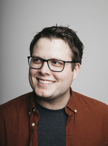 Portrait smiling confident man in eyeglasses