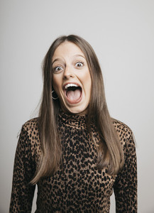 Portrait excited young woman with mouth open